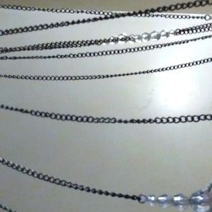 Faux crystal multi-chain necklace.